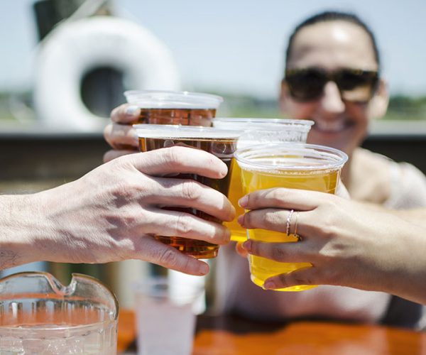 cheers-at-an-outdoor-lunch_t20_XQwK1z